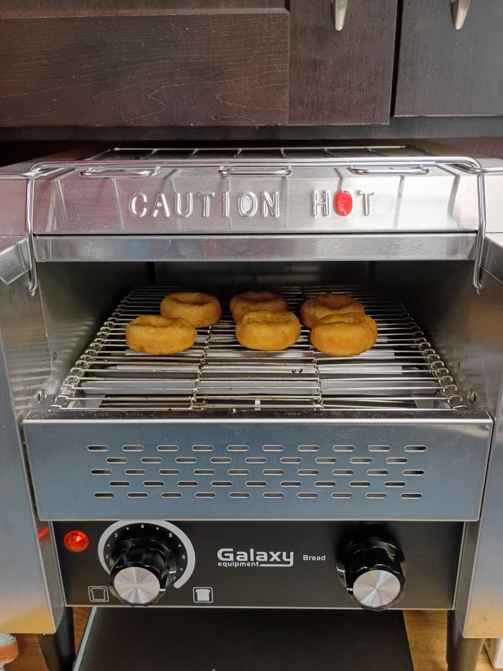 Donut warmer behind the Bro Bears counter